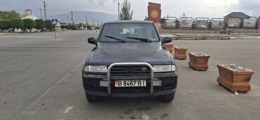 ssangyong musso: Внедорожник темно-зеленого цвета. Матор Рекстон 2.9 (привозной, год
