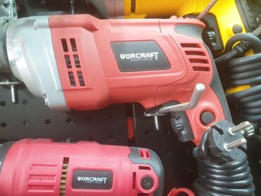 купить сабельную пилу по металлу: Ударная дрель Worcraft красного цвета с серебристыми элементами