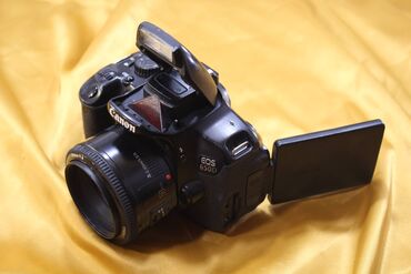 Fotokameralar: Canon 650D + 35 mm lens + 50mm 1.4 yongnuo lens təcili satılır real