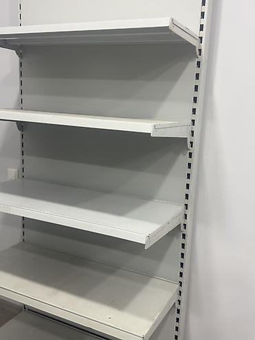 Металлический стеллаж торговый - Конструкция: стойка с перфорацией и
