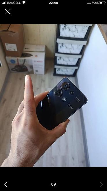 Xiaomi Redmi smartfon - Arxa panel: parlaq qara, “Redmi” loqosu, 108