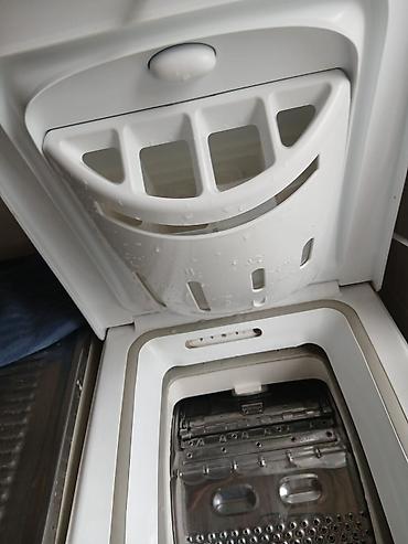 vertical: Paltaryuyan maşın Hotpoint Ariston, 6 kq, İşlənmiş, Avtomat, Qurutma var, Ünvandan götürmə — 6