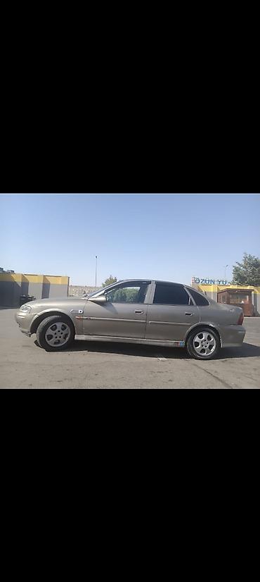 gurcustan avtomobil ehtiyat hisseleri: Opel Vectra B sedan - Korpus: 4 qapılı sedan, boz rəng - Mühərrik və — 5