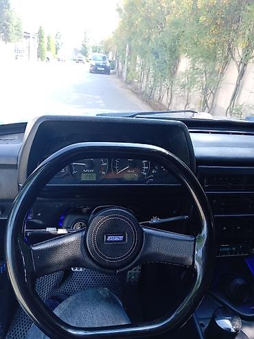 reduktur: Lada Niva (VAZ 2121) – mavi rəngli, 3 qapılı off-road SUV — 9