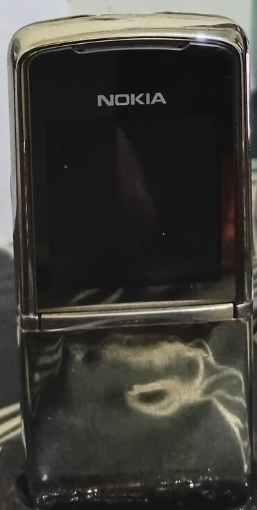 Nokia: Nokia 1, rəng - Gümüşü, Düyməli — 9