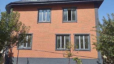 Фиброцементные фасадные панели: Двухэтажный дом с комбинированной отделкой фасада: одна часть — 12