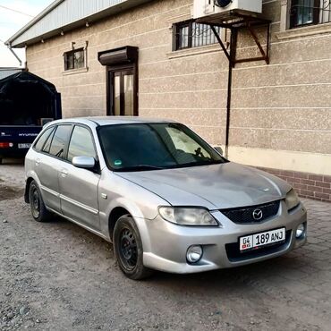 срочно продаю в связи с переездом: Mazda 323: 2002 г., 1.6 л, Механика, Бензин, Хетчбек