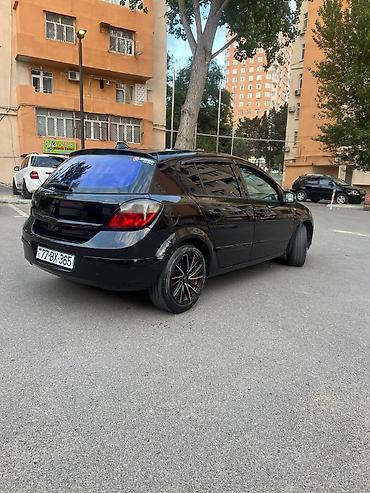 mini cooper 2009: Marka/model: Opel Astra H (hatchback, 5 qapı) Rəng: qara (parlaq) — 7