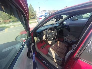 Opel: Opel Vectra B, qırmızı rəng, sedan/götürmə tipli kuzov (5 qapı) — 5