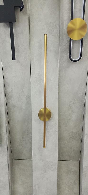 bra isiqlar: Minimalist dizaynda divar lampası. Uzun, silindrik formalı bu — 1