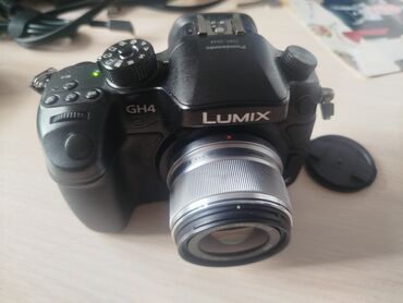 колонка караоке с микрофоном купить: Фотоаппарат Panasonic Lumix GH4 с объективом. Компактная камера