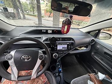 byd e1: Toyota Aqua: 2016 г., 1.5 л, Вариатор, Гибрид, Хэтчбэк — 7