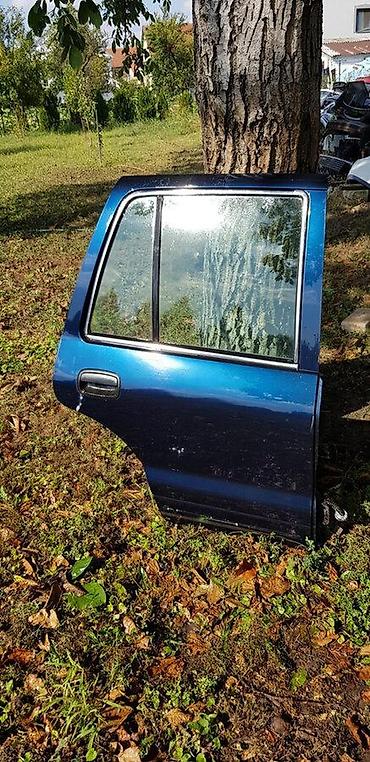 K00 VRATA ZADNJA DESNA ZA KIA SPORTAGE OD 1993. DO 2003. GOD