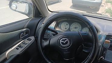 форт грзовой: Mazda 323: 2002 г., 1.6 л, Механика, Бензин, Хэтчбэк — 2