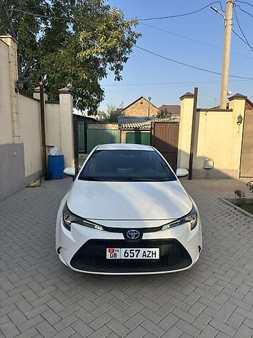 королла 2015: Toyota Corolla: 2023 г., 1.8 л, Автомат, Гибрид, Седан — 1
