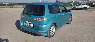 калганы: Mazda Demio: 2003 г., Автомат, Бензин — 3