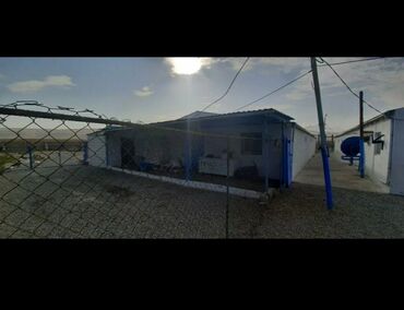 Kommersiya daşınmaz əmlakının satışı: Obyekt ofis satılır.1 hektar daş hasarlı sahəsi var.Tikili sahə — 9