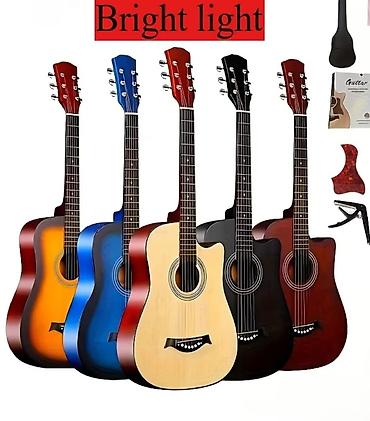 Akustik gitaralar 75-azn Ünvan Q Qarayev metrosunun düz çıxışında
