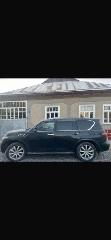 машина инфинити: Полноразмерный внедорожник Infiniti QX56 черного цвета. Модель второго