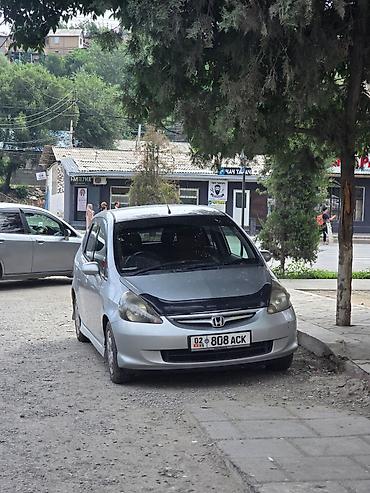 голф 2салон: Honda Fit: 2003 г., 1.3 л, Вариатор, Бензин, Хэтчбэк — 6