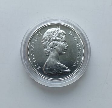 мужская серебро: Серебряную продам монету