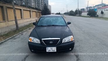 niva qapi: Hyundai Elantra: 1.6 l | 2005 il Sedan