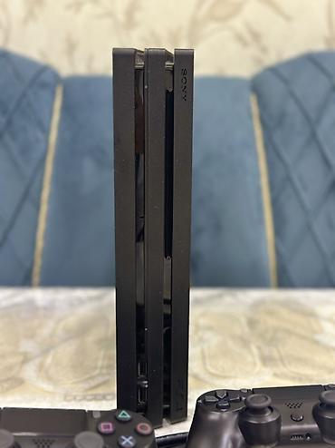 PS4 (Sony Playstation 4): Ps 4 Pro 1 Tb Yaddaş. Klub mali deyil ! EV SERAITINDE ISLENIB — 2