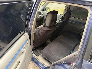 ann chery: Mazda Demio: 2001 г., 1.5 л, Механика, Бензин — 7