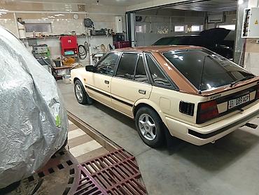 жук жабан: Nissan Bluebird: 1990 г., 2 л, Дизель, Лифтбек — 9