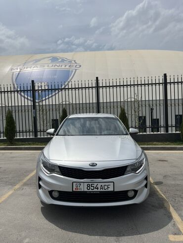 киа спектро: Серебристый седан Kia Optima. Автомобиль с черной решеткой радиатора и