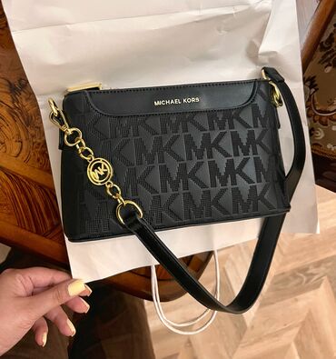 Çantalar: Michael Kors, İşlənmiş
