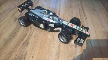 Igračke: 1. Formula 1 nema daljinski Crno Siva 44 x 18 cm 2. Formula crvena — 3