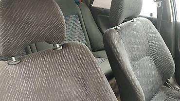 Транспорт: Mazda 323: 1990 г., Седан — 7