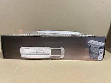 Ostali kućni aparati: TRONIC prenosivi sekač dokumenata - Tip: rezalica papira (strip-cut) — 12