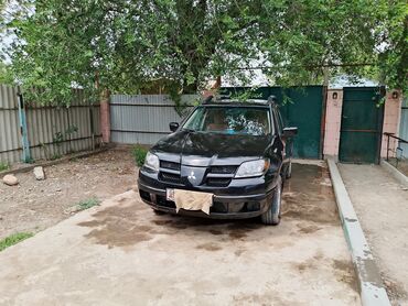 купить бронированную машину: Mitsubishi Outlander, 4WD, черный кроссовер. Основные особенности: -