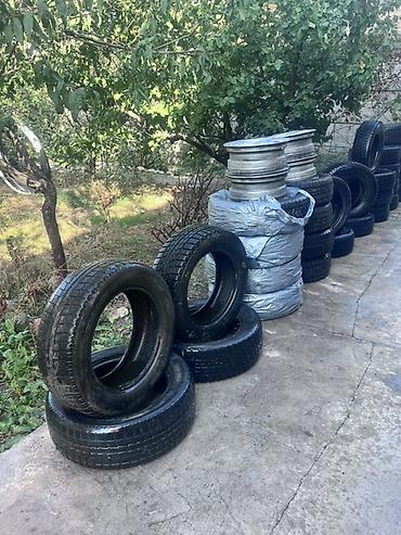 Шины: Комплект зимних шин Goodyear ICENAVI размером 205/70 R15 96T. На фото — 1
