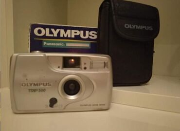 neftciler masaj salonu: Olympus retro fotoaparat işləyir, kosmetik təmirə ehtiyacı var