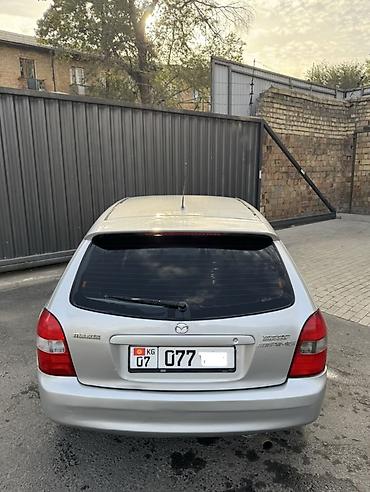 rexton j4: Mazda Familia: 2002 г., 1.6 л, Механика, Бензин, Хэтчбэк — 6