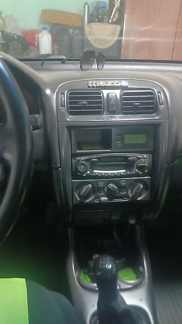 e6 3: Mazda 626: 1999 г., 1.8 л, Механика, Бензин, Универсал — 7