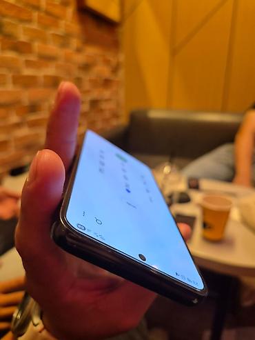 samsung 10a: Samsung Galaxy S23, rəng - Qara, Simsiz şarj — 2
