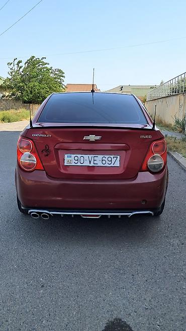 mercedes 208 d: Chevrolet Aveo sedan – qırmızı rəng, 4 qapı. Texniki və komfort — 4