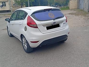 nolyeddi şəkilləri: Ford Fiesta: 1.4 l | 2009 il 255 km Hetçbek — 1
