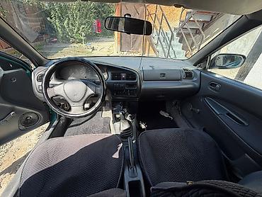 рама газ 52 53: Mazda 323: 1996 г., Механика, Бензин, Седан — 6