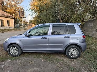 дайхатсу мира: Mazda Demio: 2005 г., 1.3 л, Автомат, Бензин, Хэтчбэк — 9