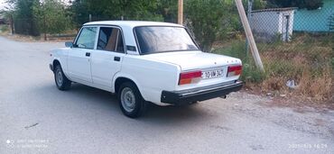 VAZ (LADA): Vaz 2107, ağ rəng, 4 qapılı sedan. Xüsusiyyətlər: - Klassik kuzov — 4