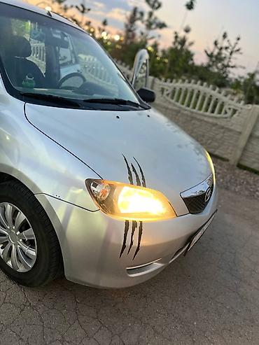 мата секыл: Mazda 2: 2003 г., 1.3 л, Кол менен иштөөчү, Бензин, Хетчбек — 9