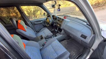 Toyota: Toyota RAV4: 2 l | 1997 il Ofrouder/SUV — 4