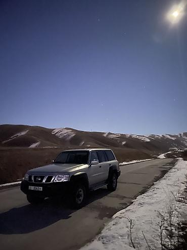 рул: Nissan Patrol: 2015 г., 4.8 л, Кол менен иштөөчү, Бензин — 2