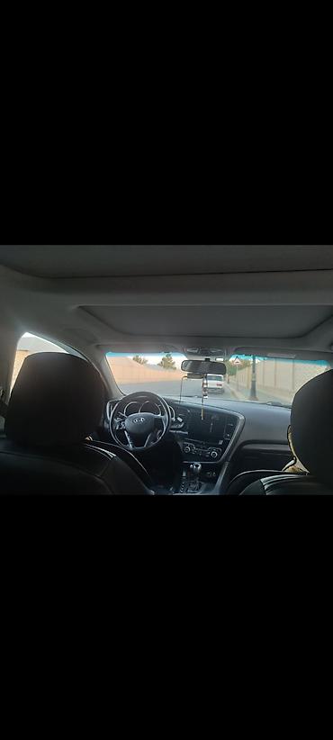 opel zafira b: Kia Optima: 2 l | 2011 il Sedan — 4