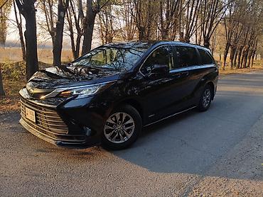 lx 570 2014: Toyota Sienna: 2021 г., 2.5 л, Вариатор, Гибрид, Минивэн — 2